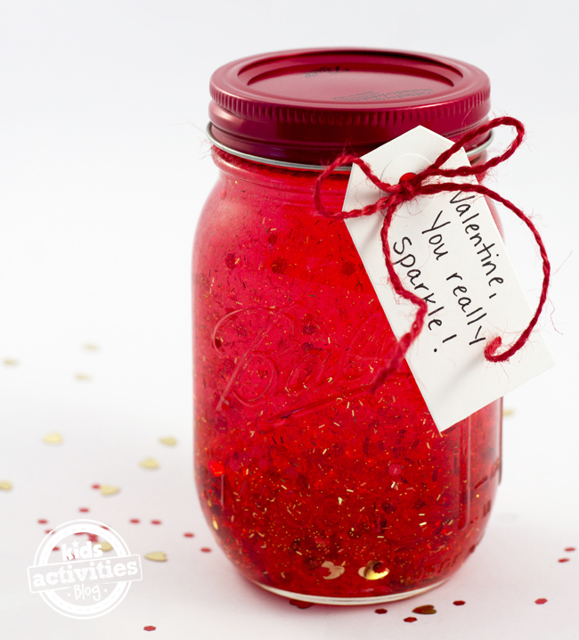 Valentine sensory jar- bottle art with red gel and sparkles