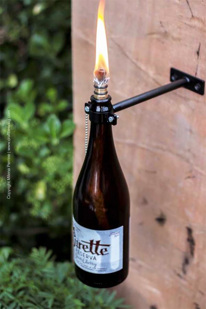 Tiki torches made from bottles- bottle art