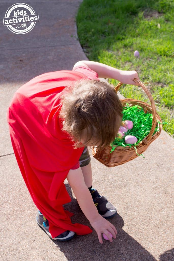 Easter Egg Hunt - Hatchimal egg found by a kid wearing a cloak