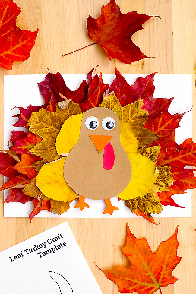 Leaf turkey made with a free printable turkey template and colourful leaves