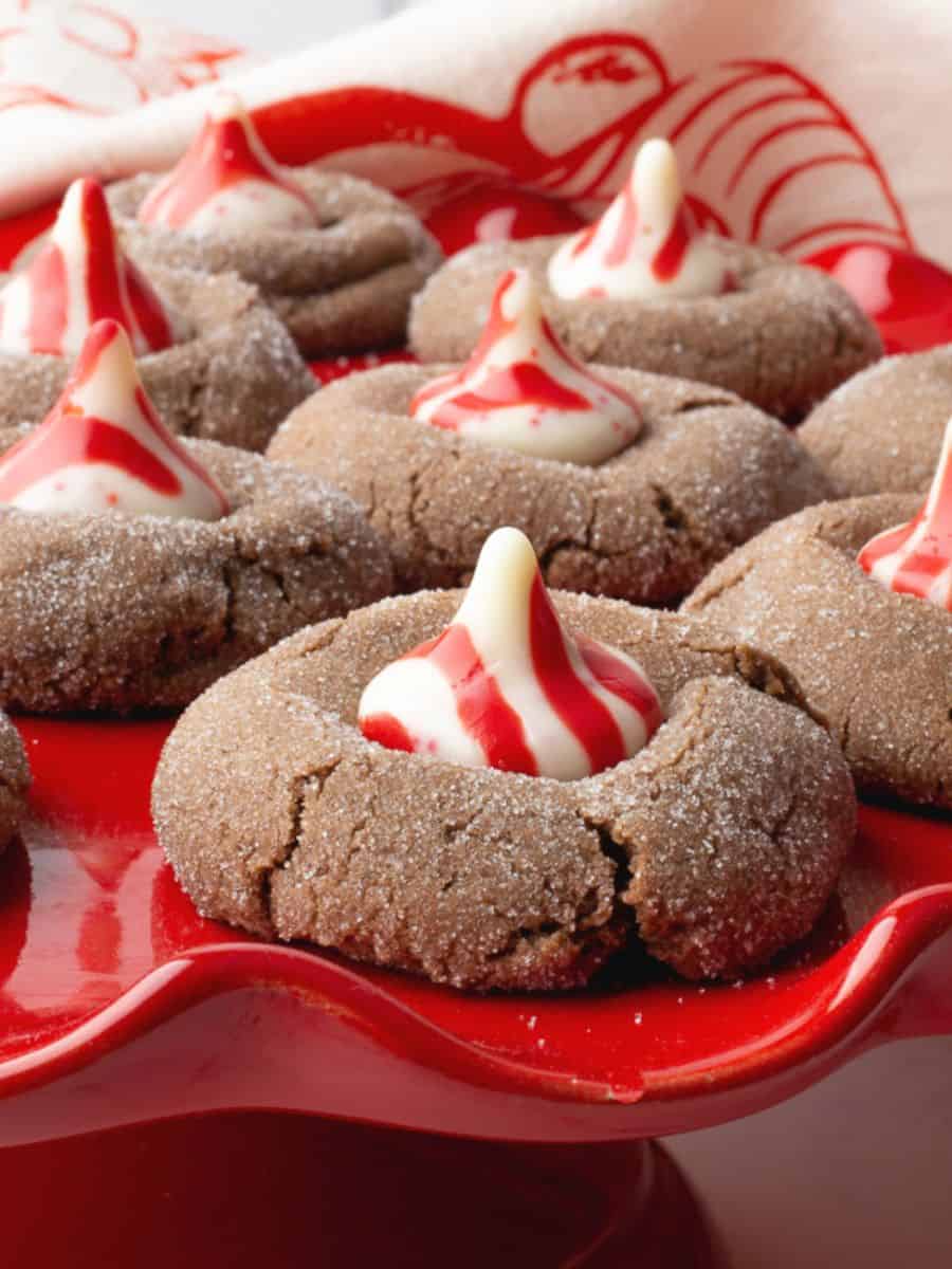 Peppermint blossom cookies on red plate.