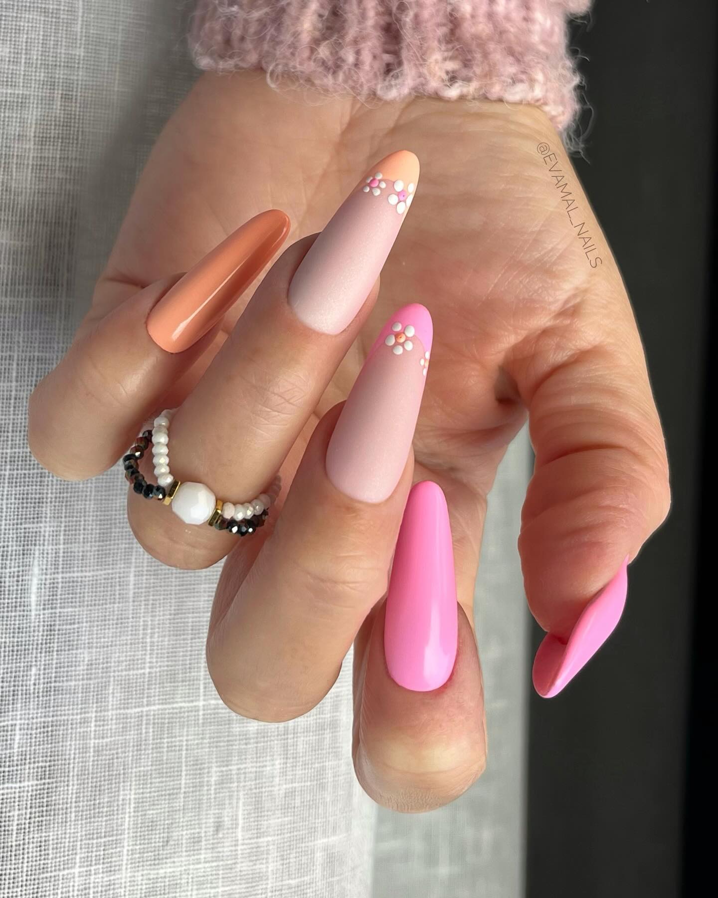 Spring french tip nails with a mix of pink and blue french tip nails, embodying spring nail designs and colorful nails for the season.